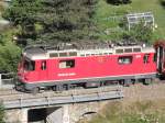 Ge 4/4 II 615  Klosters  mt RE nach St. Moritz am 19.07.10. kurz hinter dem Bahnhof von Bergn.
